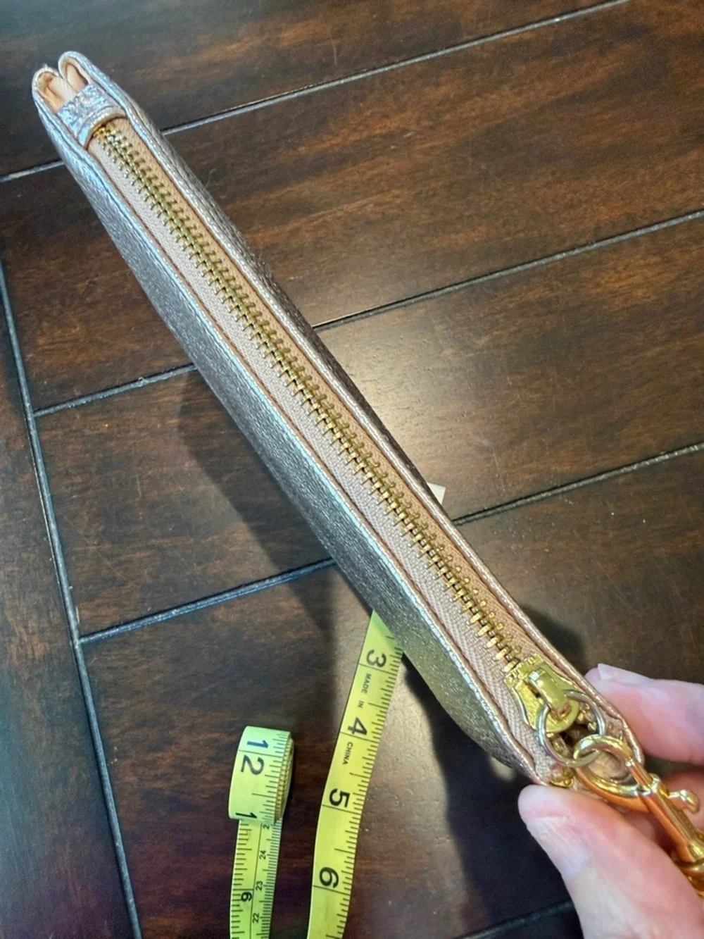 Francesca’s Rose Gold Clutch Wristlet